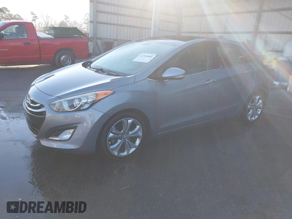 2014 Hyundai Elantra GT with VIN KMHD35LH1EU162934, listed as a IAAI auction lot 41705866 with 121,709 mi miles. Bid and sale history available at carsss.com. Image 2.