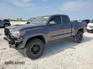2017 Toyota Tacoma SR5 z VIN 5TFRZ5CNXHX025315, wystawiony jako Copart lot #57901395 z przebiegiem 158 197 mil mil oraz Szkoda całkowita • Salvage title. Historia ofert i sprzedaży dostępna na DreamBid. Obrazek 1.