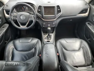 2016 Jeep Cherokee Limited with VIN 1C4PJLDB0GW287372, listed as a Copart auction lot 52795535 with 173,038 mi miles and Salvage title. Bid and sale history available at DreamBid. Image 8.