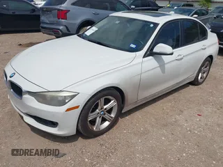 2013 BMW 3 Series 328i with VIN WBA3A5C5XDJ461783, listed as a IAAI auction lot 42150355 with 115,992 mi miles and . Bid and sale history available at DreamBid. Image 2.