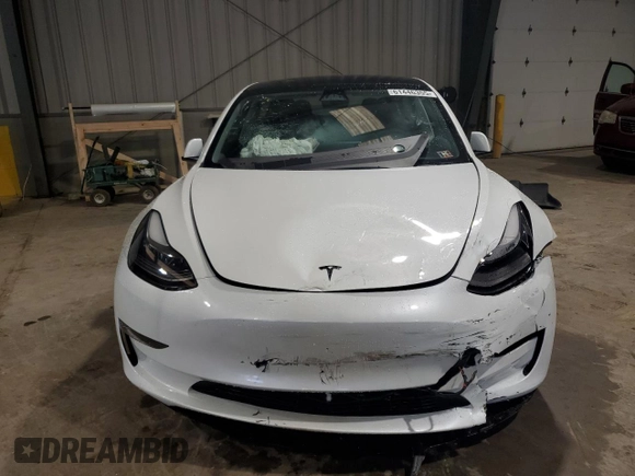 2023 Tesla Model 3 with VIN 5YJ3E1EA6PF588701, listed as a Copart auction lot 61446355 with Not provided miles and Salvage title. Bid and sale history available at DreamBid. Image 5.