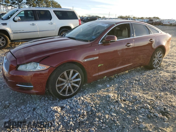 2012 Jaguar XJ with VIN SAJWA1CB3CLV37685, listed as a Copart auction lot 87586005 with 59,885 mi miles and Salvage title. Bid and sale history available at DreamBid. Image 1.