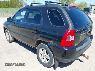 2010 Kia Sportage LX with VIN KNDKGCA34A7669279, listed as a IAAI auction lot 42132770 with 142,828 mi miles and . Bid and sale history available at carsss.com. Image 3.