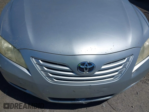 2007 Toyota Camry CE with VIN JTNBE46K173119853, listed as a IAAI auction lot 42133844 with 243,587 mi miles and . Bid and sale history available at DreamBid. Image 6.