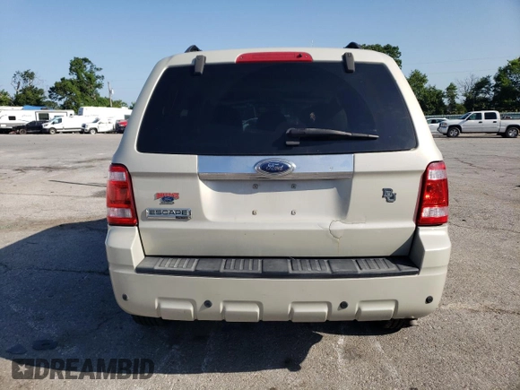 2009 Ford Escape Limited с VIN 1FMCU04G59KB71672, выставлен на аукционе Copart как лот 61250115 с пробегом 160 259 миль миль и Списание • Salvage title. История ставок и продаж доступна на DreamBid. Изображение 6.