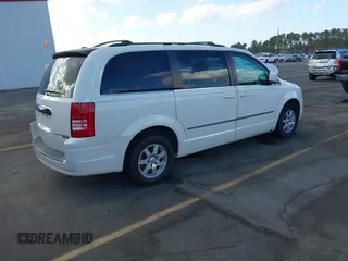 2010 Chrysler Town & Country Touring with VIN 2A4RR5DX4AR435106, listed as a IAAI auction lot 40726036 with 241,470 mi miles. Bid and sale history available at carsss.com. Image 4.