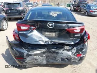 2018 Mazda 3 Touring with VIN 3MZBN1V34JM261565, listed as a IAAI auction lot 41795238 with 121,112 mi miles. Bid and sale history available at carsss.com. Image 17.