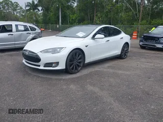 2013 Tesla Model S Performance with VIN 5YJSA1DP9DFP04076, listed as a IAAI auction lot 42185465 with 179,640 mi miles and . Bid and sale history available at DreamBid. Image 2.