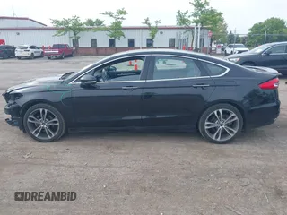 2020 Ford Fusion Titanium with VIN 3FA6P0K94LR117138, listed as a IAAI auction lot 42345819 with 88,117 mi miles and . Bid and sale history available at DreamBid. Image 15.