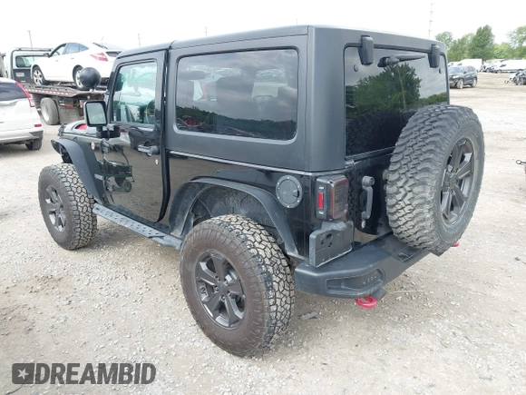 2018 Jeep Wrangler Rubicon Recon with VIN 1C4BJWCG6JL814834, listed as a IAAI auction lot 42327297 with 59,623 mi miles and . Bid and sale history available at DreamBid. Image 3.