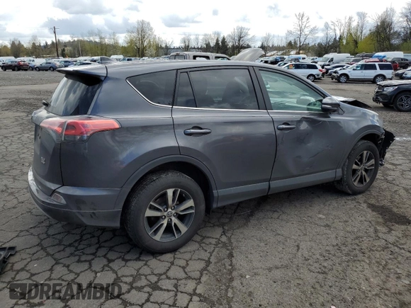 2018 Toyota RAV4 XLE with VIN 2T3RFREV2JW791353, listed as a Copart auction lot 51588515 with 126,830 mi miles and Salvage Title. Bid and sale history available at DreamBid. Image 3.
