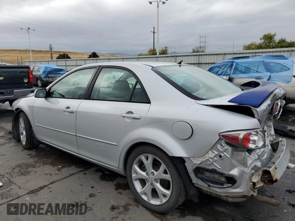 2006 Mazda 6 i with VIN 1YVFP80CX65M55409, listed as a Copart auction lot 76844234 with 143,238 mi miles and Salvage Title. Bid and sale history available at carsss.com. Image 2.