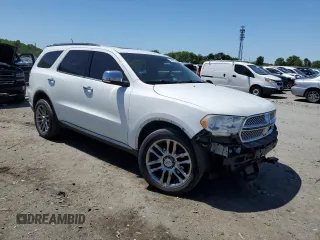 2013 Dodge Durango Citadel с VIN 1C4SDJET0DC512576, выставлен на аукционе Copart как лот 54809835 с пробегом 190 455 миль миль и Списание • Salvage title. История ставок и продаж доступна на DreamBid. Изображение 4.