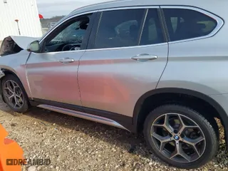 2019 BMW X1 sDrive28i with VIN WBXHU7C52K3H44360, listed as a IAAI auction lot 41709431 with 56,432 mi miles. Bid and sale history available at carsss.com. Image 15.