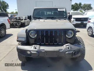 2023 Jeep Gladiator Sport S с VIN 1C6HJTAG3PL552959, выставлен на аукционе Copart как лот 56905635 с пробегом 30 356 миль миль и Списание • Salvage title. История ставок и продаж доступна на DreamBid. Изображение 5.
