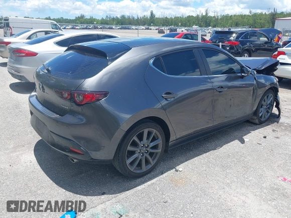 2022 Mazda 3 Select z VIN JM1BPAKL1N1519383, wystawiony jako IAAI lot #39742243 z przebiegiem 20 080 mil mil oraz . Historia ofert i sprzedaży dostępna na DreamBid. Obrazek 4.