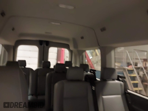 2019 Ford Transit Passenger XL z VIN 1FMZK1CM8KKA27343, wystawiony jako IAAI lot #41607428 z przebiegiem 110 797 mil mil oraz . Historia ofert i sprzedaży dostępna na DreamBid. Obrazek 8.