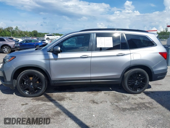 2022 Honda Pilot Special Edition with VIN 5FNYF5H25NB034822, listed as a IAAI auction lot 40341057 with 25,931 mi miles and . Bid and sale history available at DreamBid. Image 14.