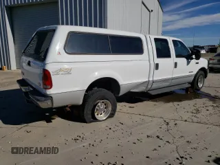 2000 Ford F-350 XL with VIN 1FTSW31F5YEA50810, listed as a Copart auction lot 77443774 with 147,370 mi miles and Salvage Title. Bid and sale history available at DreamBid. Image 3.