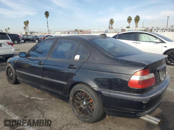2002 BMW 3 Series 330i with VIN WBAEV53452KM00658, listed as a Copart auction lot 82062874 with 106,031 mi miles and Salvage Title. Bid and sale history available at carsss.com. Image 2.