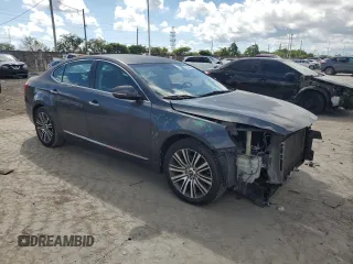 2014 Kia Cadenza Premium with VIN KNALN4D79E5134770, listed as a Copart auction lot 73569374 with 141,599 mi miles and Salvage Title. Bid and sale history available at carsss.com. Image 4.