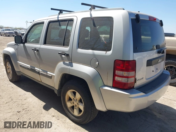 2012 Jeep Liberty Sport with VIN 1C4PJMAK1CW106039, listed as a IAAI auction lot 41810966 with 120,121 mi miles. Bid and sale history available at carsss.com. Image 3.