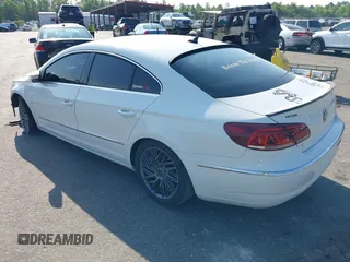 2015 Volkswagen CC R-Line with VIN WVWBN7AN3FE819870, listed as a IAAI auction lot 39390950 with 86,082 mi miles. Bid and sale history available at carsss.com. Image 3.