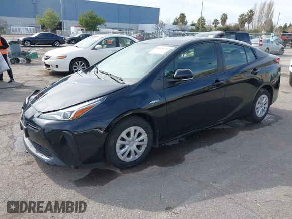 2022 Toyota Prius L Eco with VIN JTDKAMFU2N3157283, listed as a IAAI auction lot 41620334 with 59,754 mi miles and . Bid and sale history available at DreamBid. Image 16.