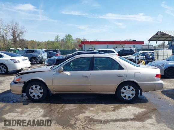 2001 Toyota Camry CE with VIN 4T1BG22K11U114688, listed as a IAAI auction lot 42065715 with 150,181 mi miles. Bid and sale history available at carsss.com. Image 14.