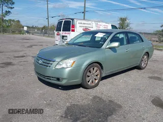 2006 Toyota Avalon XL with VIN 4T1BK36B76U105760, listed as a IAAI auction lot 41736905 with 148,990 mi miles. Bid and sale history available at carsss.com. Image 2.