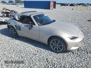 2023 Mazda MX-5 Miata Grand Touring z VIN JM1NDAM70P0551336, wystawiony jako Copart lot #54984385 z przebiegiem 10 948 mil mil oraz Szkoda całkowita • Salvage title. Historia ofert i sprzedaży dostępna na DreamBid. Obrazek 4.