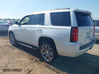 2020 Chevrolet Tahoe LT with VIN 1GNSCBKC9LR196546, listed as a IAAI auction lot 41661308 with 132,714 mi miles. Bid and sale history available at carsss.com. Image 3.