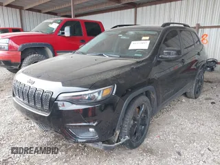 2020 Jeep Cherokee Altitude with VIN 1C4PJLLB8LD585577, listed as a IAAI auction lot 41372097 with 99,377 mi miles. Bid and sale history available at carsss.com. Image 2.