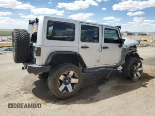 2012 Jeep Wrangler Unlimited Altitude with VIN 1C4HJWEG8CL163653, listed as a Copart auction lot 55279045 with 107,076 mi miles and Salvage title. Bid and sale history available at DreamBid. Image 3.