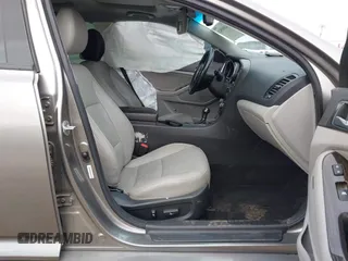2015 Kia Optima EX with VIN 5XXGN4A7XFG423145, listed as a IAAI auction lot 42068943 with 113,730 mi miles and . Bid and sale history available at DreamBid. Image 5.