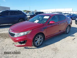 2013 Kia Optima EX with VIN 5XXGN4A72DG165295, listed as a IAAI auction lot 41269214 with 167,001 mi miles. Bid and sale history available at carsss.com. Image 6.