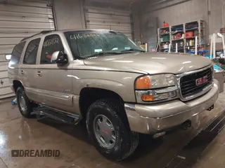 2002 GMC Yukon SLT with VIN 1GKEK13Z72J177940, listed as a IAAI auction lot 41682822 with 184,577 mi miles. Bid and sale history available at carsss.com. Image 1.