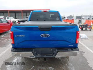 2015 Ford F-150 XL with VIN 1FTEX1C82FKD57797, listed as a IAAI auction lot 41986388 with 197,434 mi miles and . Bid and sale history available at DreamBid. Image 17.