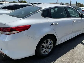 2016 Kia Optima LX with VIN KNAGT4L33G5093593, listed as a Copart auction lot 53171795 with 124,344 mi miles and Clean Title. Bid and sale history available at carsss.com. Image 4.