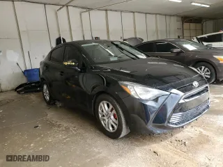 2018 Toyota Yaris iA with VIN 3MYDLBYV1JY323566, listed as a Copart auction lot 52021145 with 100,977 mi miles and Salvage Title. Bid and sale history available at carsss.com. Image 4.