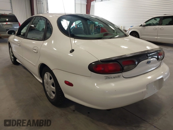 1998 Ford Taurus z VIN 1FAFP52S1WA120013, wystawiony jako IAAI lot #41987332 z przebiegiem 179 500 mil mil oraz . Historia ofert i sprzedaży dostępna na DreamBid. Obrazek 3.