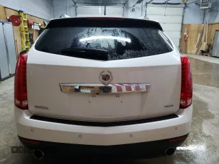 2012 Cadillac SRX Luxury Collection with VIN 3GYFNAE35CS596878, listed as a Copart auction lot 50736725 with 130,007 mi miles and Clean Title. Bid and sale history available at DreamBid. Image 6.