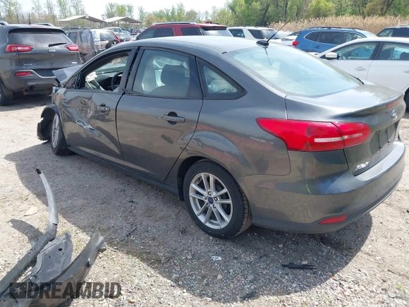 2017 Ford Focus SE with VIN 1FADP3F20HL335881, listed as a IAAI auction lot 42074241 with 127,741 mi miles. Bid and sale history available at carsss.com. Image 3.