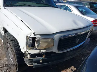 2000 Cadillac Escalade z VIN 1GYEK63R7YR226034, wystawiony jako IAAI lot #41224406 z przebiegiem 293 123 mil mil oraz . Historia ofert i sprzedaży dostępna na DreamBid. Obrazek 6.