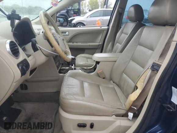 2005 Ford Freestyle Limited z VIN 1FMDK03125GA70464, wystawiony jako Copart lot #72003044 z przebiegiem 259 595 mil mil oraz Szkoda całkowita • Salvage title. Historia ofert i sprzedaży dostępna na DreamBid. Obrazek 7.