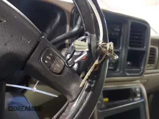 2004 Chevrolet Suburban LT z VIN 1GNFK16Z94J134187, wystawiony jako IAAI lot #41810015 z przebiegiem 262 667 mil mil oraz . Historia ofert i sprzedaży dostępna na DreamBid. Obrazek 11.