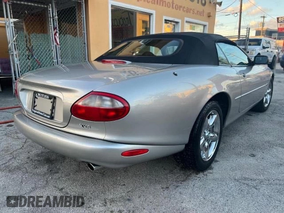 1999 Jaguar XK z VIN SAJGX204XXC041660, wystawiony jako Copart lot #88755785 z przebiegiem 70 091 mil mil oraz Tytuł czysty. Historia ofert i sprzedaży dostępna na DreamBid. Obrazek 4.