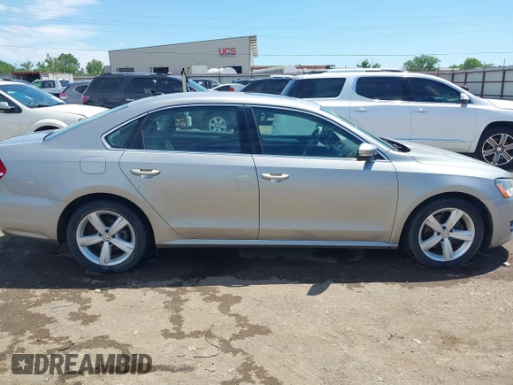 2013 Volkswagen Passat SE with VIN 1VWBP7A37DC140683, listed as a IAAI auction lot 42245864 with 125,898 mi miles and . Bid and sale history available at DreamBid. Image 13.