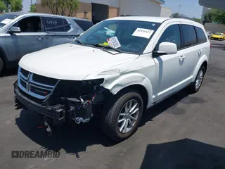 2013 Dodge Journey SXT with VIN 3C4PDCBG4DT696966, listed as a IAAI auction lot 42555632 with 144,927 mi miles and . Bid and sale history available at DreamBid. Image 2.