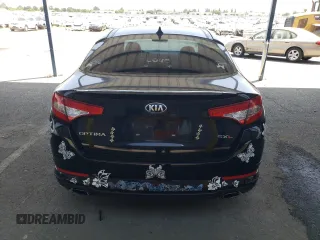 2013 Kia Optima SX с VIN 5XXGR4A65DG190896, выставлен на аукционе Copart как лот 59630485 с пробегом 136 385 миль миль и Списание • Salvage title. История ставок и продаж доступна на DreamBid. Изображение 6.